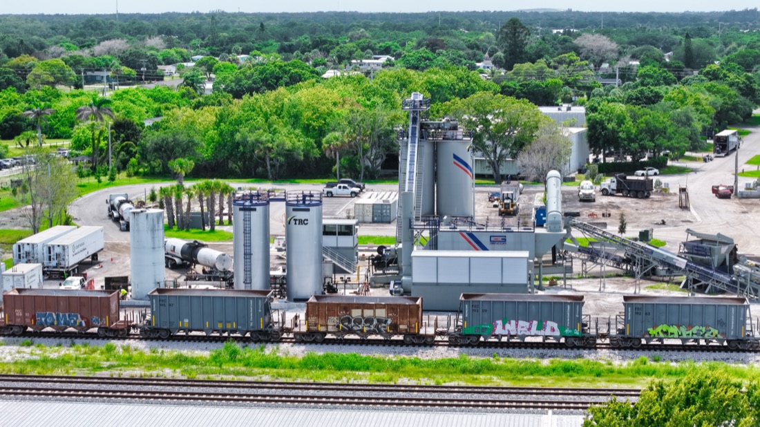 Exterior view of the EAM Gencor asphalt batch plant and storage silos at the Vero Beach facility